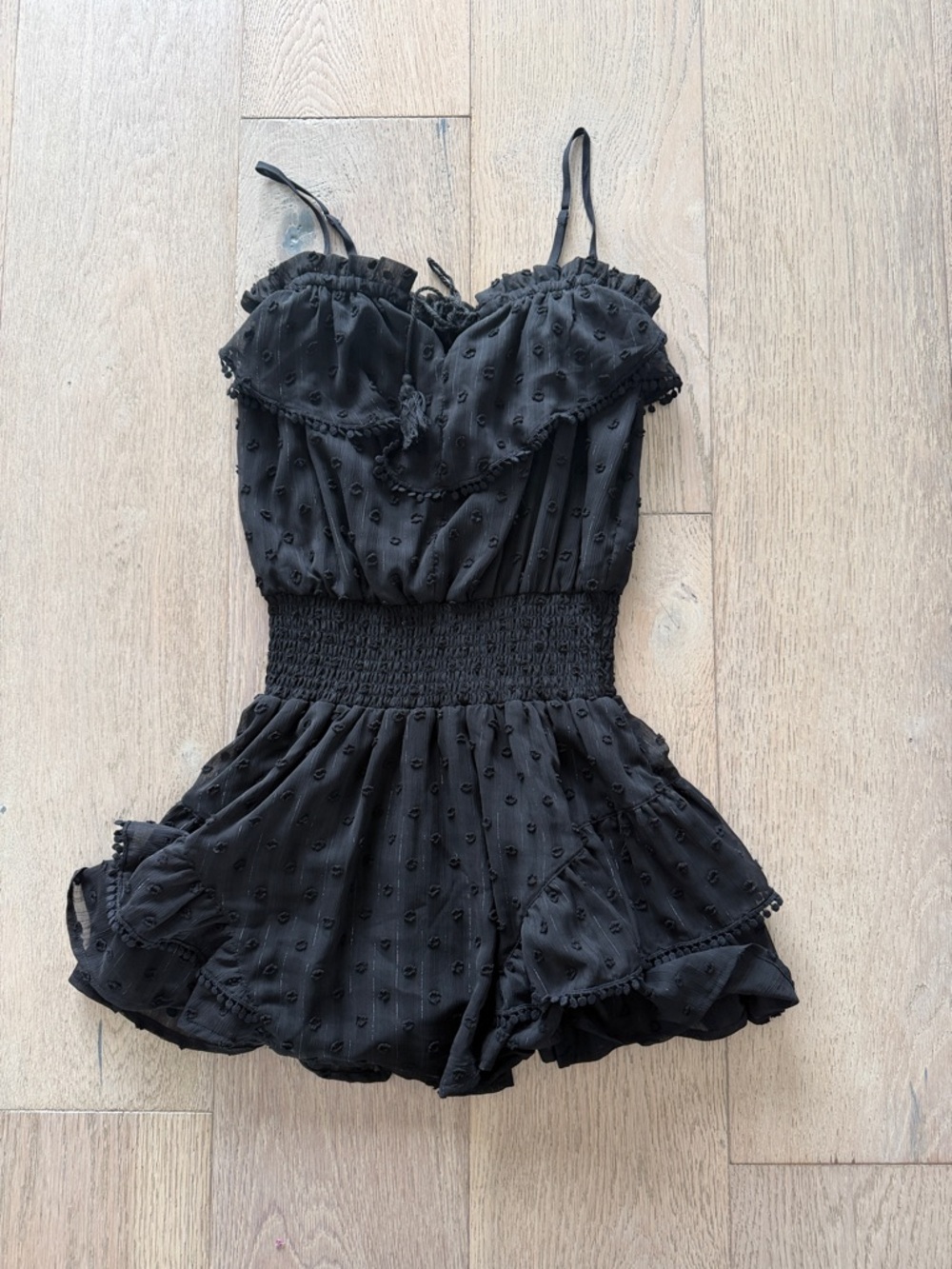 Katie J NYC Little Black Smocked Romper with Ruffle Trim